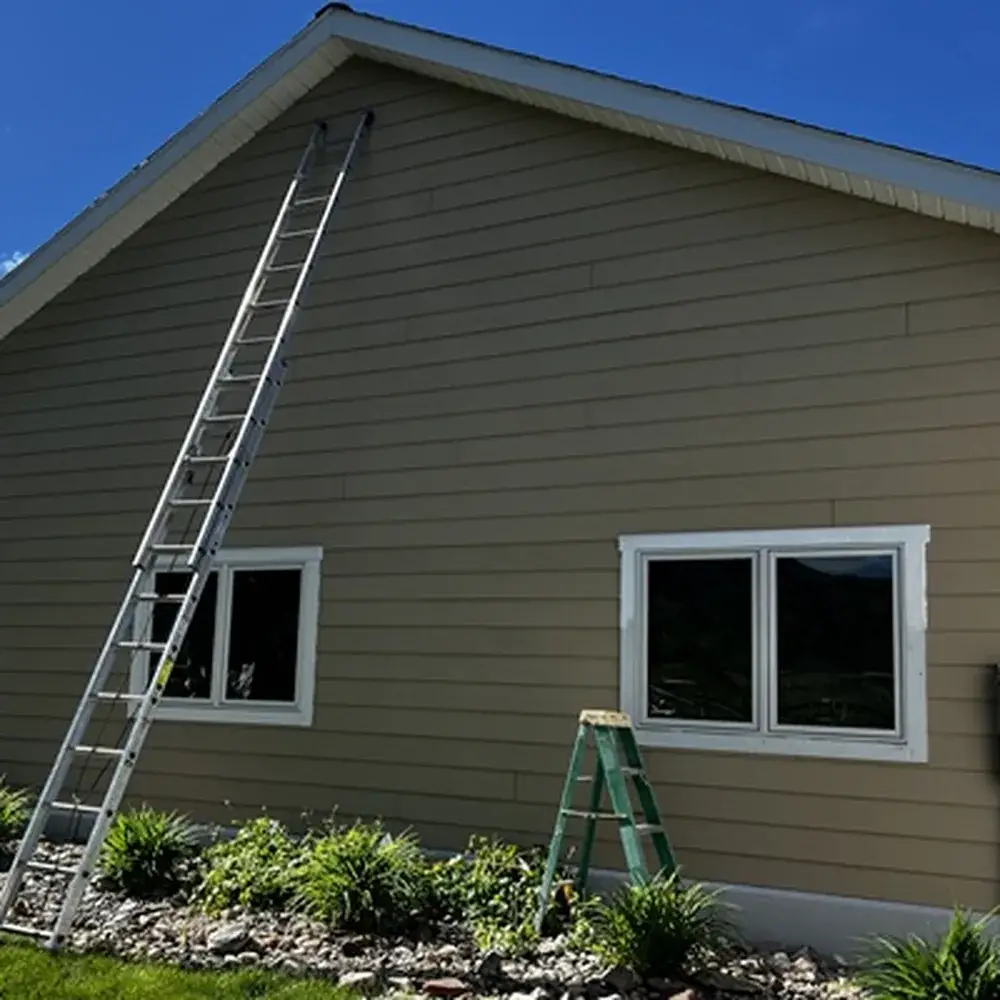 Handyman Services in Bozeman - MT underway as a technician repairs interior trim and shelving